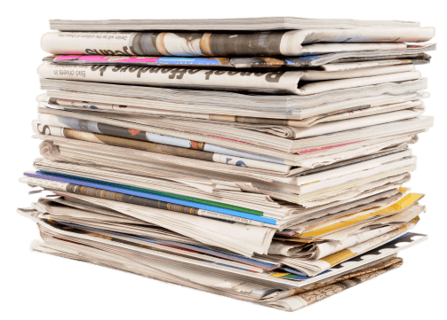 A stack of newspapers piled on top of each other